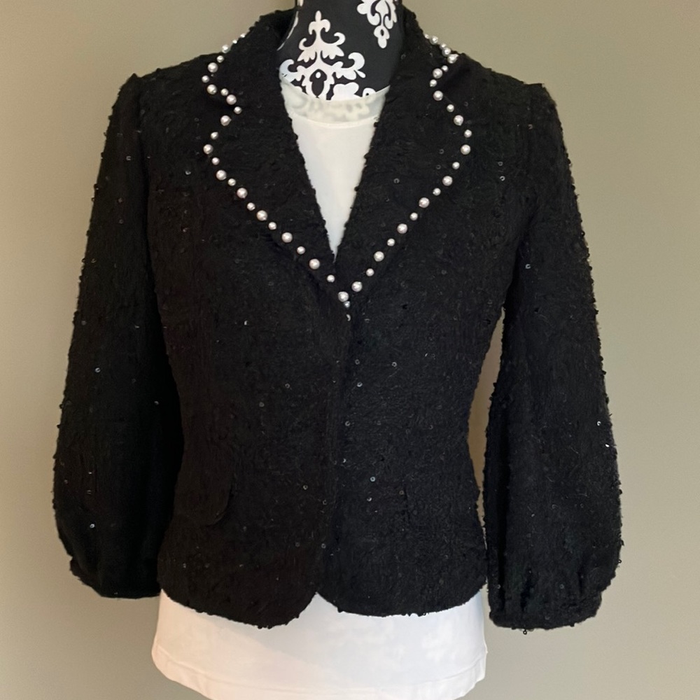 Fun pearl collared black jacket with fun knotted and sequenced blazer.